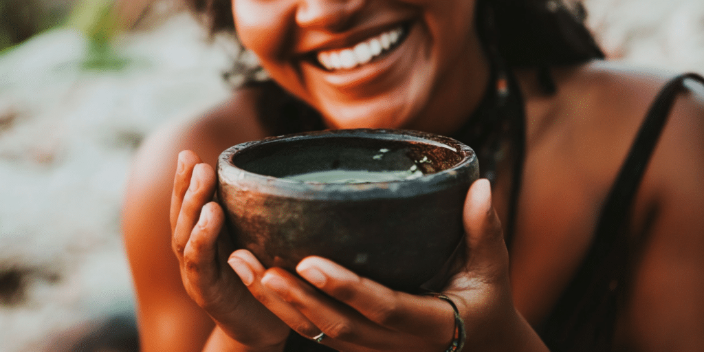 happy person drinking kava